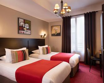 Hotel Chatillon Montparnasse - Parigi - Camera da letto