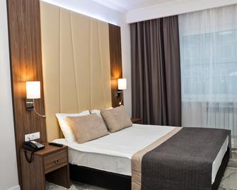 Rubin Hotel - Juschno-Sachalinsk - Schlafzimmer