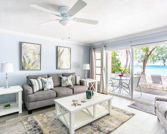 White Sands 11-Beachfront Condo directly on 7 Mile Beach. Call Cayman Villas! - West Bay - Living room