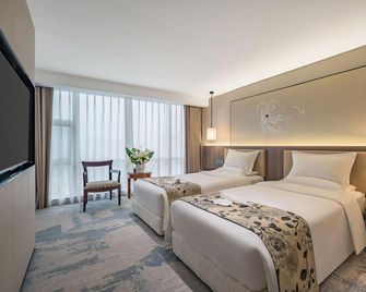 Peony Plaza - Luoyang - Κρεβατοκάμαρα