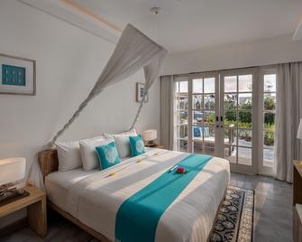 Kardia Resort A Pramana Experience - Pemenang - חדר שינה