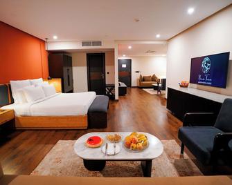 Nine Tree Luxury Hotel & Suites Lahore - Lahore - Phòng ngủ