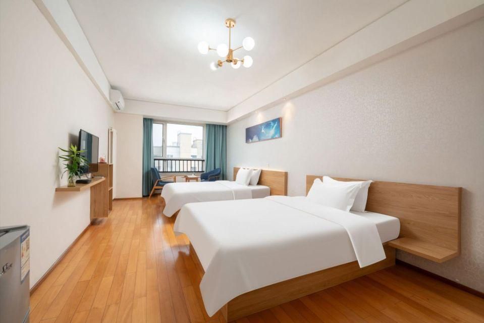 Zhumei Impression Apartment (Qingdao Guoxin Convention And Exhibition Center Shop) - تشينغداو - غرفة نوم