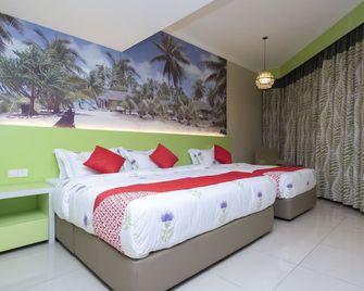 Hotel Holmes Gp - Gelang Patah - Schlafzimmer