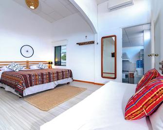 La K-leta Boutique Guesthouse - Puerto Ayora - Yatak Odası