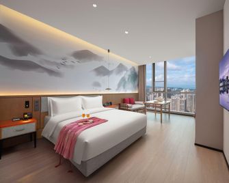 Moshang Meilu Hotel (Kunming High-speed Railway South Station Colorful Yunnan No.1 City Branch) - Kunming - Habitación