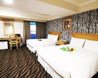 Liho Hotel Tainan - טאינאן - חדר שינה