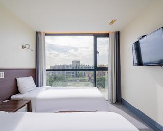 Sunrise Hotel Jungmun Branch - Seogwipo - Habitación