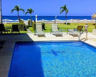 Beachfront one-bedroom, ocean view condo with toes in the sand! - Puerto Viejo - Piscina