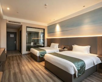 Donghe Xinyue Hotel (Hanzhong High-Speed Railway Station Branch) - Hanzhong - Slaapkamer