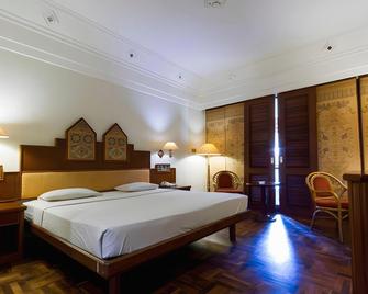 Pusako Hotel Bukittinggi - Bukittinggi - Schlafzimmer