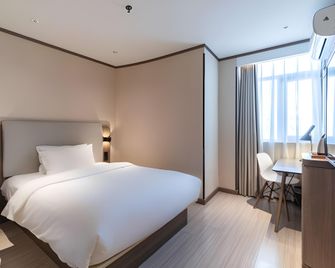 Hanting Hotel Taizhou Wanda - Taizhou - Bedroom