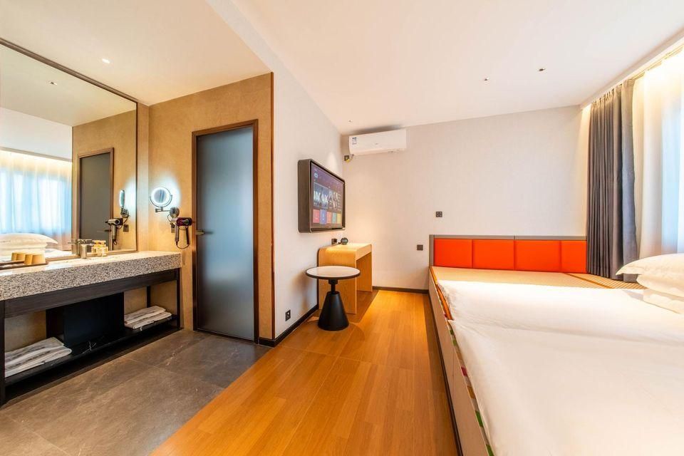 Boshu Unique Hotel - هاربين - غرفة نوم