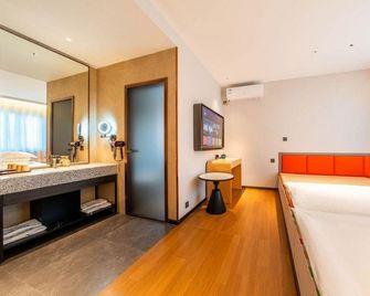 Boshu Unique Hotel - Harbin - Slaapkamer