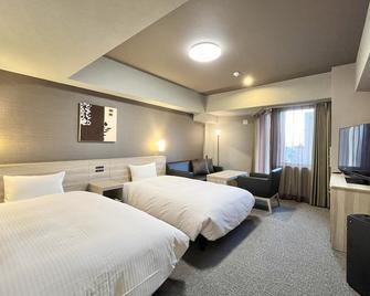 Hotel Route-Inn Nagaoka Ekimae - Nagaoka - Camera da letto