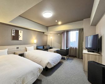 Hotel Route-Inn Nagaoka Ekimae - Nagaoka - Bedroom