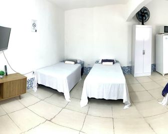 Pousada Aconchego Ocian - Praia Grande - Bedroom