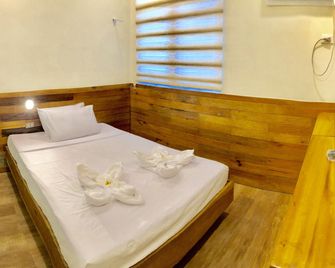 Two Seasons Executive Suites - Zamboanga City - Habitación