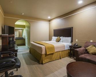 Scottish Inn & Suites Baytown - Baytown - Bedroom