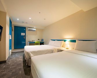 لوموس إن - مدينة تايبيه - غرفة نوم