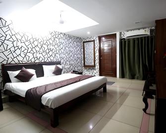 Hotel Seven Karnavati Resort - Ahmedabad - Bedroom