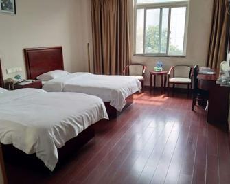 Greentree Inn Nanjing Lukou Konggang General Avenue Express Hotel - Nankín - Habitación