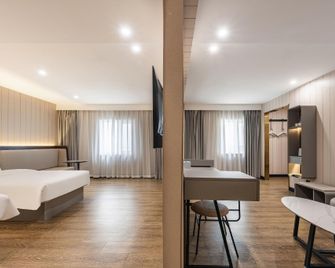 Hanting Hotel Tianjin Dagang Jinqi Road - Tianjin - Bedroom