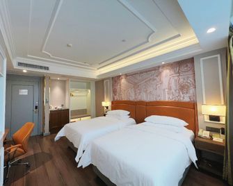 Vienna International Hotel Jieyang International Commodity City - Jieyang - Habitación