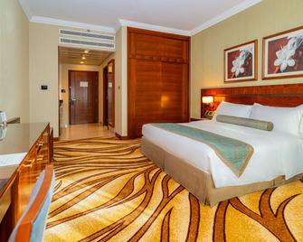 Majlis Grand Mercure Residence Abu Dhabi - Abu Dhabi - Bedroom