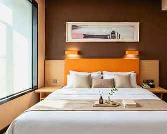 7 Days Premium·Deyang Shifang Square - Deyang - Bedroom