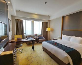 Junheng Hotel - Nanjing - Bedroom