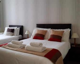 海濱別墅酒店 - 大雅茅斯 - 臥室