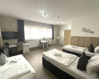 Double room Classic - Family room - Estenfeld - 침실