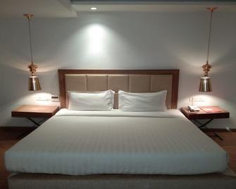 Hotel Amora - Rajnandgaon - Rajnandgaon - Habitación