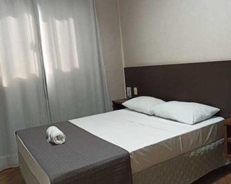 Premium Hotel - Planura - Habitación