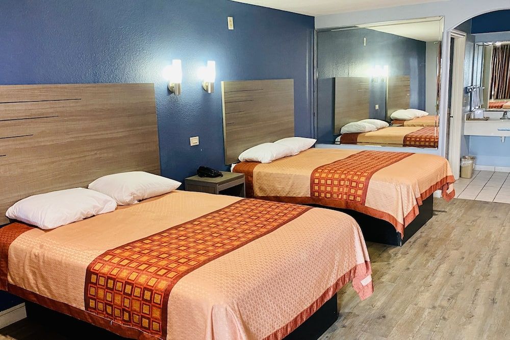 Home Place Inn and Suites-Hobby - יוסטון - חדר שינה