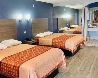 Home Place Inn & Suites - Houston - Kamar Tidur