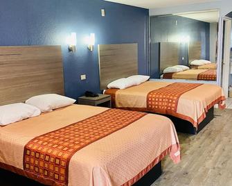 هوم بليس إن آند سويتس - هيوستن - غرفة نوم