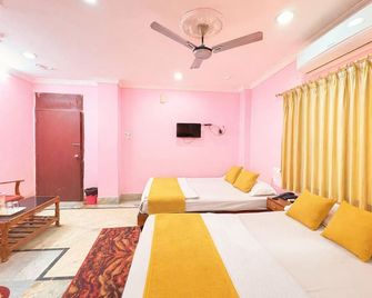 Hotel Sambit Palace Puri - פורי - חדר שינה