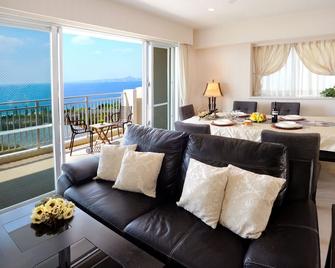 Wisteria Condominium Resort - Motobu - Wohnzimmer