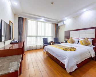 Zhongyuan International Hotel - Baoji - Schlafzimmer