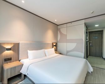 Hanting Express Changchun Renmin Square - Changchun - Bedroom