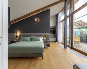 Habitat Guest House - Trento - Camera da letto