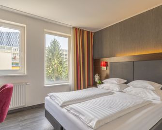 Plaza Inn Graz - Graz - Chambre