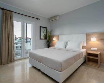 Grecoinn Grekas Classic Hotel - Neoi Poroi - Bedroom