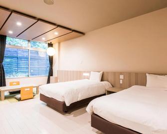 โรงแรมโออีโดะ ออนเซ็น โมโนกาตาริ อิคาโฮ - ชิบูกาว่า - ห้องนอน