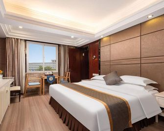 Juchunyuan Hotel - פוז'ו - חדר שינה