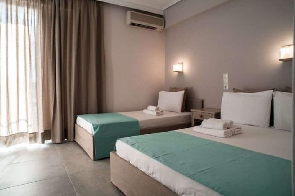 Kochili Apartments - Neos Pyrgos - Schlafzimmer