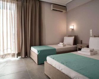 Kochili Apartments - Neos Pyrgos - Schlafzimmer