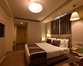 Clarens Hotel - גורגאון - חדר שינה